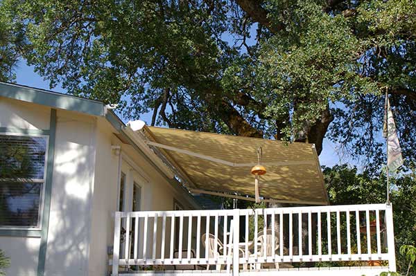 Upstairs bedroom protected from early morning sun in Placerville.